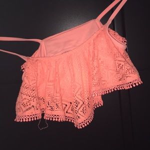 coral swimsuit top with design